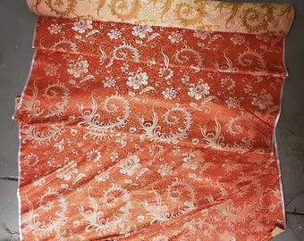 Beautiful orange scroll silk brocade