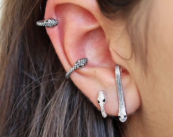 Snake 2024 rook piercing