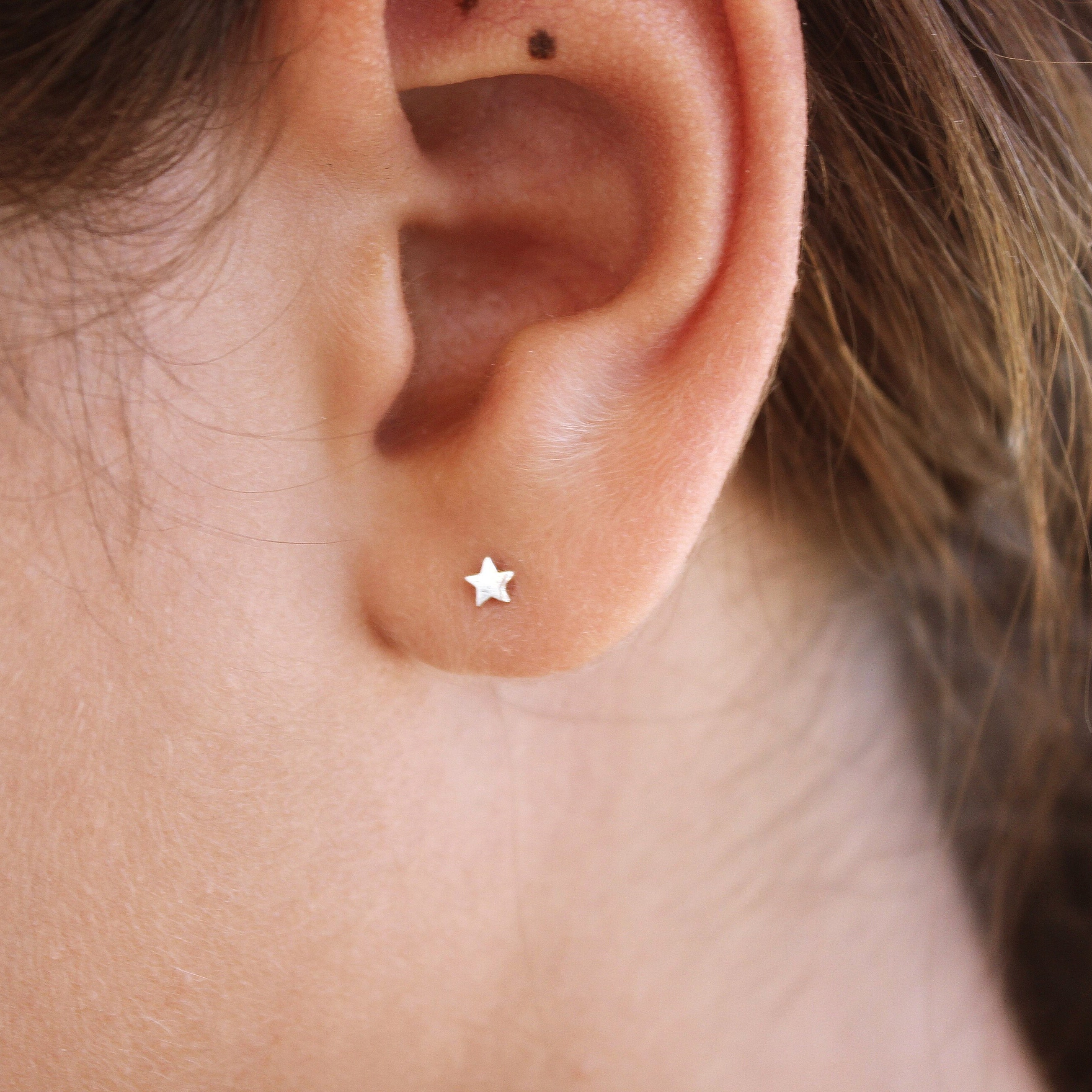 Mini hotsell star earrings