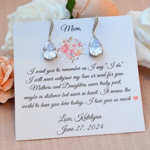 Silver cubic zirconia earrings displayed on a mother of the bride jewelry card