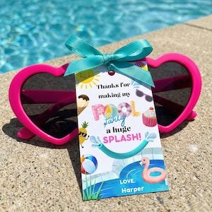 May include: Bright pink heart-shaped sunglasses with a rectangular gift tag attached by a teal ribbon. The tag features colorful summer illustrations and the text: Thanks for making my pool party a huge SPLASH! Love, Harper. The design includes a sun, ice cream, cupcake, pineapple, beach ball, and flamingo.