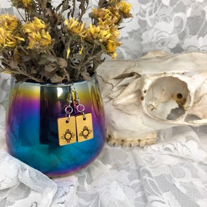 Gold zia earring dangle jewelry made in Albuquerque New Mexico southwest art and jewelry state flag burque pride