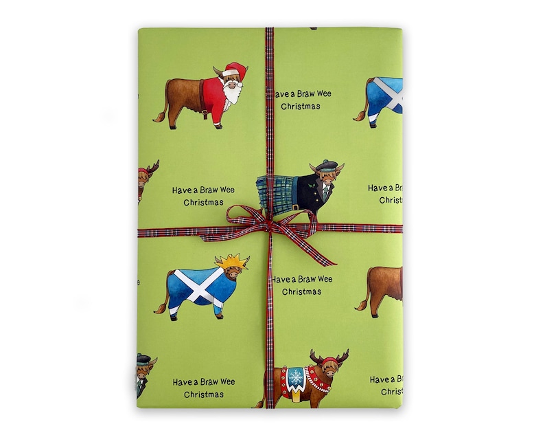 May include: Green wrapping paper with a repeating pattern of Highland cows dressed in various festive outfits, including Santa Claus, a kilt, and a Scottish flag. The text "Have a Braw Wee Christmas" is repeated throughout the paper.