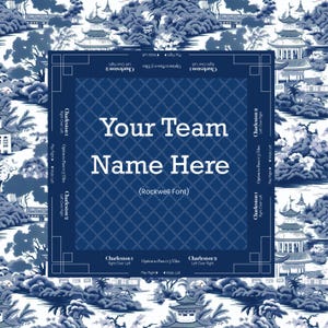 A blue and white decorative mah jong mat with a Chinoiserie pattern background. The center features a dark blue square with the text "Your Team Name Here" in white. The border includes game instructions.