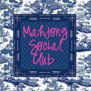 A square, blue and white mahjong  game neoprene mat ith the words "Mahjong Social Club" in pink script. The board is surrounded by a blue and white Asian-inspired pattern. The corners have text indicating game play.