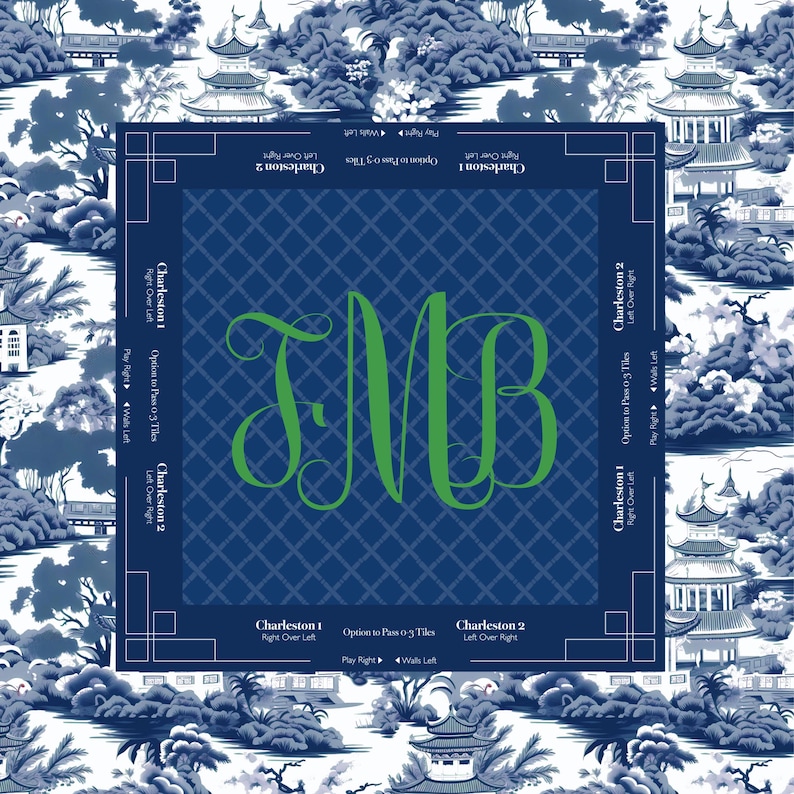 A square, navy blue mah jongg game board with a green monogram of the letters TMB. The board is surrounded by a blue and white Asian-inspired landscape design. The text "Charleston 1" and "Charleston 2" is printed on the board.