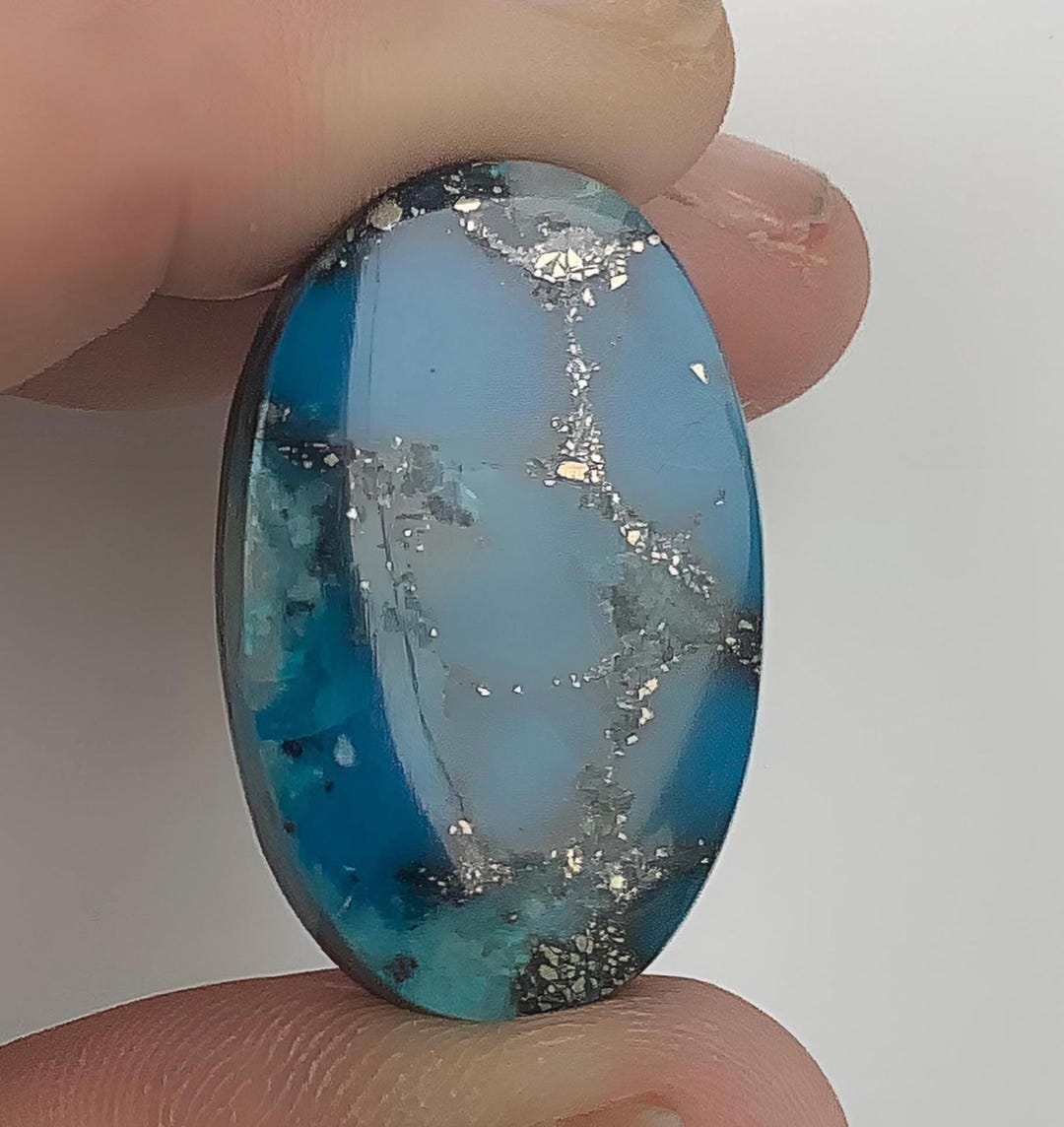 サイの季節('12イラク/トルコ) High Grade Ithaca Peak Turquoise Oval Cabochon With Quartz