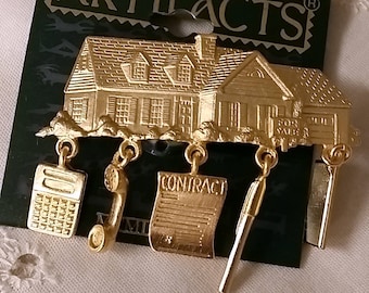 Vintage JJ Artifacts Real Estate Pin with Dangling Charms Pin Gold Tone Brooch New on Card 1986 NOS