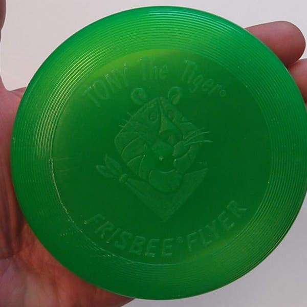 1989 Tony The Tiger Frisbee Flyer 3-3/4" Green 1989 Kellogg Company Cereal Prize Frosties Mini Frisbee