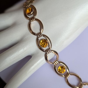 Bracelet à maillons en verre topaze Simmons des années 40 avec dos ouvert rempli d'or et lunette