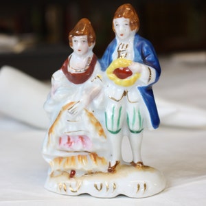 1940's Occupied Japan Porcelain Man And Woman 1800's Style Ruffled Clothing Figurine Hand Painted Figurine Statue.