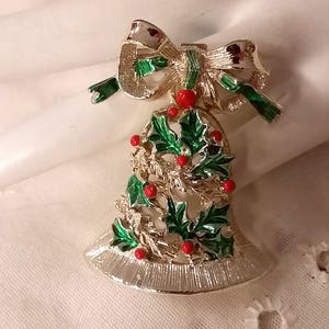 Vintage Gerry's Christmas Bell Pin Shiny Gold Tone Green Enamel Red Holly Berries 1970s image 1
