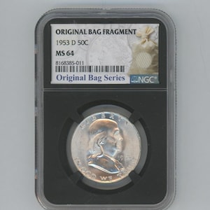 May include: A 1953 D 50C half dollar coin graded MS 64 by the Numismatic Guaranty Corporation (NGC) in a black plastic slab with a white label. The label reads "Original Bag Fragment" and "Original Bag Series".