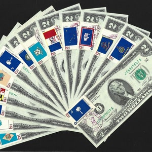 May include: A collection of twenty dollar bills with a commemorative stamp featuring the flags of each US state. The bills are fanned out in a circular pattern, with the stamp on each bill facing outward. The bills are all in good condition and have a crisp, clean appearance.