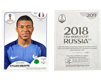May include: A collectible Panini sticker featuring Kylian Mbappé, a French soccer player. The sticker includes his name, date of birth, and measurements (1.78 m, 73 kg). The back of the sticker has the 2018 FIFA World Cup Russia logo and the number 209.