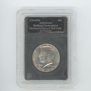 Authenticated  1976- Bicentennial Kennedy  Half Dollar  Brilliant Uncirculated BU