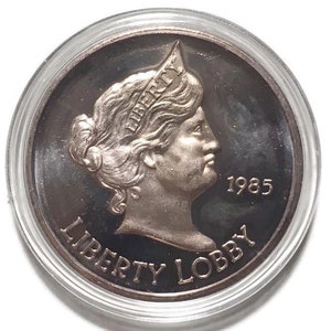 Autêntico - 1985 Liberty Lobby Silver Eagle tonificado 1 onça troy .999 prata redonda-rara