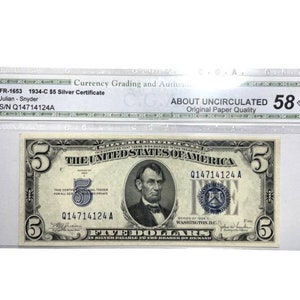 Certified 1934-C -Five Dollar Silver certificate Blue Seal  Fr.1653  About Unc 58  S/NQ14714124A