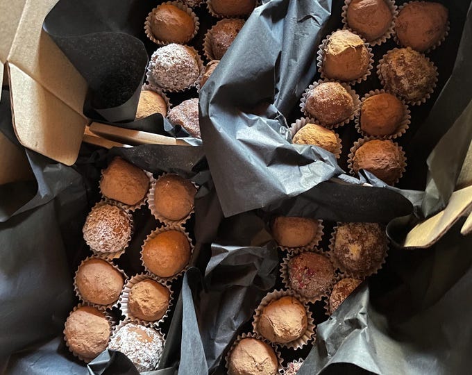 Handmade artisanal chocolate truffles, rich and decadent