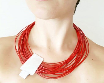 Red statement necklace Multi strand leather necklace Bib necklace Avante garde necklace Contemporary jewelry Modern unusual necklace