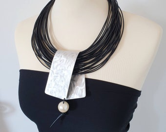 Statement necklace Bib necklace Popular necklace Leather necklace Black necklace Contemporary jewelry Unusual necklace Pearl necklace