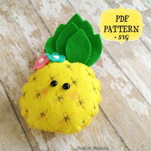 May include: A felt pineapple with a yellow body, green leaves, and pink and blue flower accents. The pineapple has embroidered details and black button eyes. The image includes the text "PDF PATTERN + SVG".