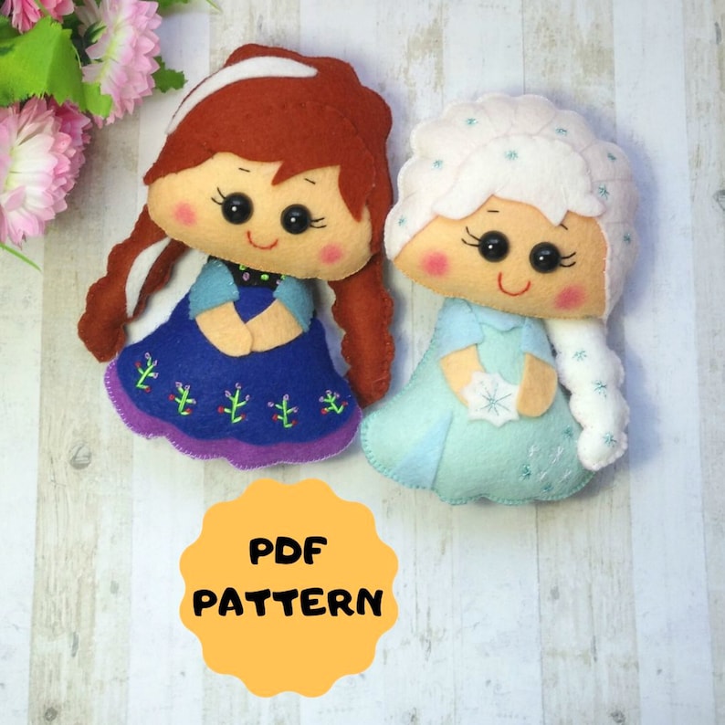 May include: A PDF pattern for making felt dolls of Anna and Elsa from the movie Frozen. The dolls are dressed in their signature blue and light blue dresses. The pattern is available for download.
