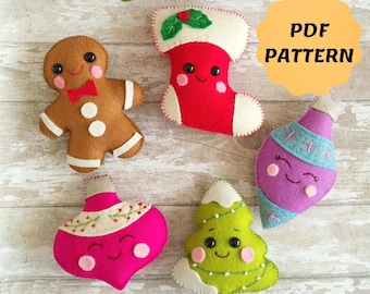 May include: Five felt Christmas ornaments: a gingerbread person, a stocking, a purple ornament, a pink ornament, and a green Christmas tree.  The ornaments have embroidered faces and details.  PDF PATTERN.
