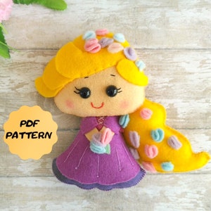 May include: A felt doll pattern of a princess with long blonde hair, a purple dress, and a flower in her hand. The pattern includes instructions for making the doll.