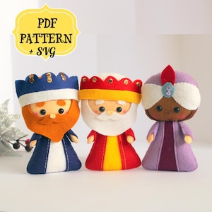 May include: Three felt Christmas ornaments depicting the Three Wise Men. The figures are wearing colorful robes and crowns. The Wise Men are holding gifts in their hands. The text "PDF PATTERN + SVG" is in a yellow banner at the top of the image.