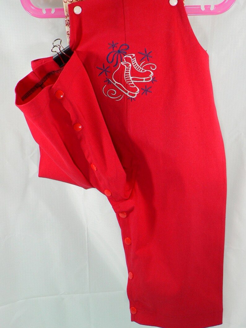 Clearance red ice skating overalls size 1T or 12 to 18 months with snowflake straps
