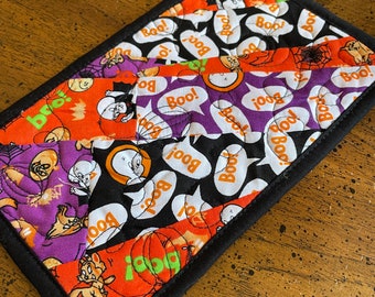 Purple Boo Halloween Mug Rug, Strip Pieced Fun coaster with cartoon prints in orange, black, and purple