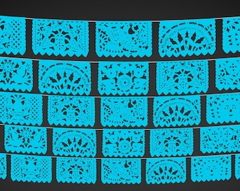 May include: A string of blue paper cutouts, known as papel picado, hangs from a string. The cutouts are in various shapes and designs, including flowers, circles, and stars.