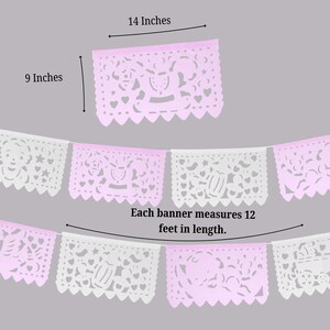 May include: A pink and white paper banner with a baby carriage design. Each banner measures 12 feet in length. The banner is 14 inches wide and 9 inches tall.