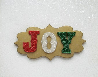 Beaded Joy Plaque handcrafted Holiday home decor Red Silver Green Sparkly Beads