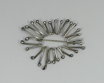 modern brooches and pins