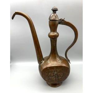 Antique Persian Ewer Etched Copper Pitcher With Intricate Animal Motif Design
