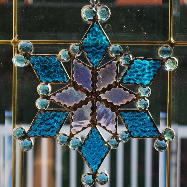 Stained glass baby blue snowflake