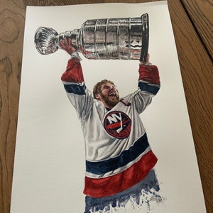 May include: A watercolor painting of a hockey player holding up the Stanley Cup trophy. The player is wearing a white jersey with the New York Rangers logo and a red, white, and blue uniform. The player has a beard and is smiling.