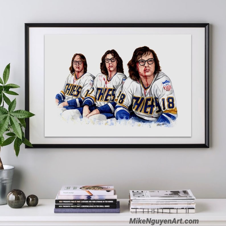May include: Watercolor painting of three hockey players wearing white jerseys with blue and gold accents. The jerseys have the text "THES 18" on them. The players have blood on their faces and are looking at the viewer.