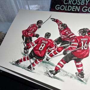 May include: Watercolor painting of three hockey players in red and white uniforms. The players are in a dynamic pose, with one player in the foreground holding a hockey stick and another player in the background with a raised stick. The painting is signed by the artist.