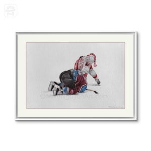 May include: A watercolour painting depicting two hockey players in action. One player, wearing a red and white jersey, is on top of another player wearing a black and maroon jersey. The player in the red and white jersey is holding a hockey stick and is about to take a shot. The player in the black and maroon jersey is on the ice and is trying to defend himself.