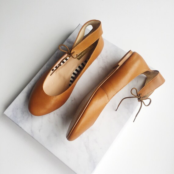 tan ballerinas