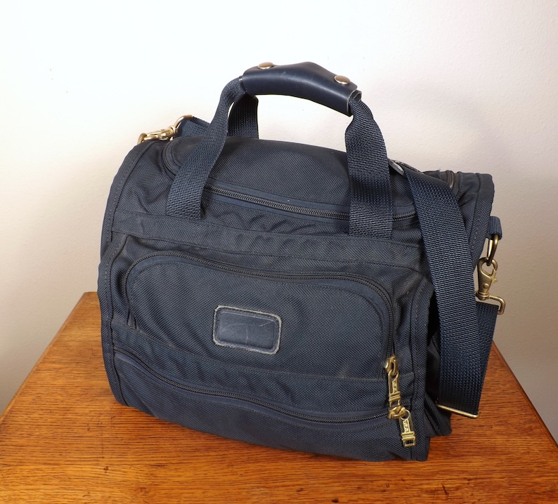 tumi carry bag