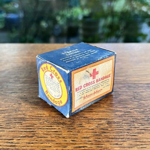 Caja de vendajes de la Cruz Roja - Sin abrir - Johnson & Johnson - Primeros auxilios vintage - Suministro de boticario - Década de 1930-40 - Anuncio médico/de primeros auxilios