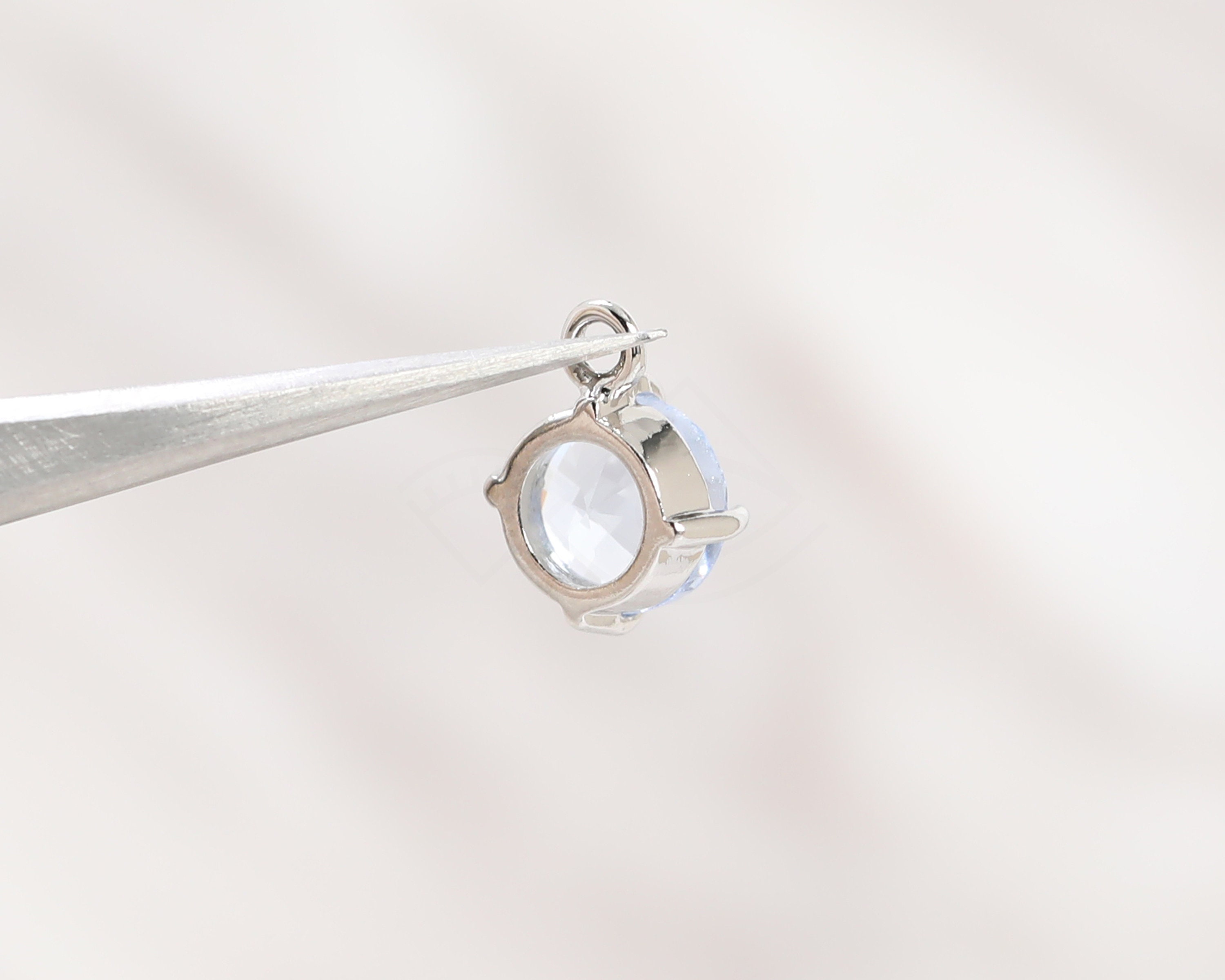 1133091 / Light Sapphire / 16k Gold Plated Brass Framed