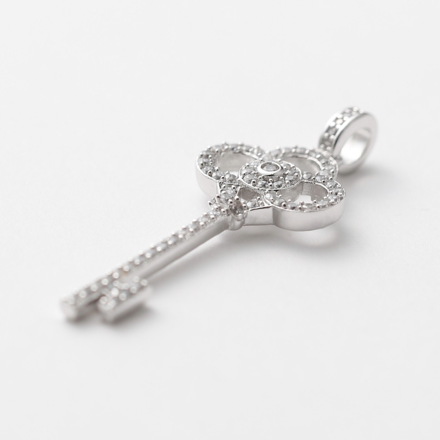 3263012 / CZ Key / Rhodium Plated Brass With CZ Pendant 15.5