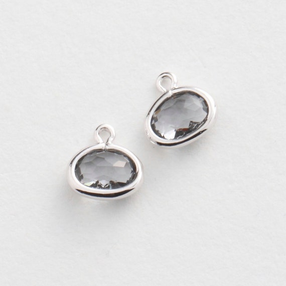 1070242 / Charcoal / Rhodium Plated Brass Framed Glass