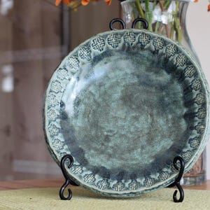 Handmade pottery/ceramic birdbath/feeder basin with embossed celtic design