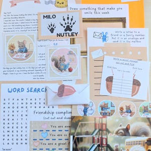 May include: A collection of stationery items with a playful theme. Includes illustrated cards, envelopes, a word search, and a drawing prompt. Features cartoon mice and squirrels, with the text "MILO NUTLEY".
